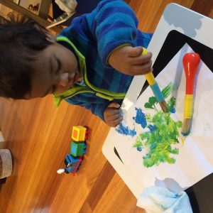Encouraging my toddler to paint handmade Eid cards