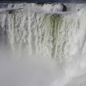 The Devil's Throat is a veritable wall of water cascading down in twisted, frothy jets, Iguazu Falls, Argentina