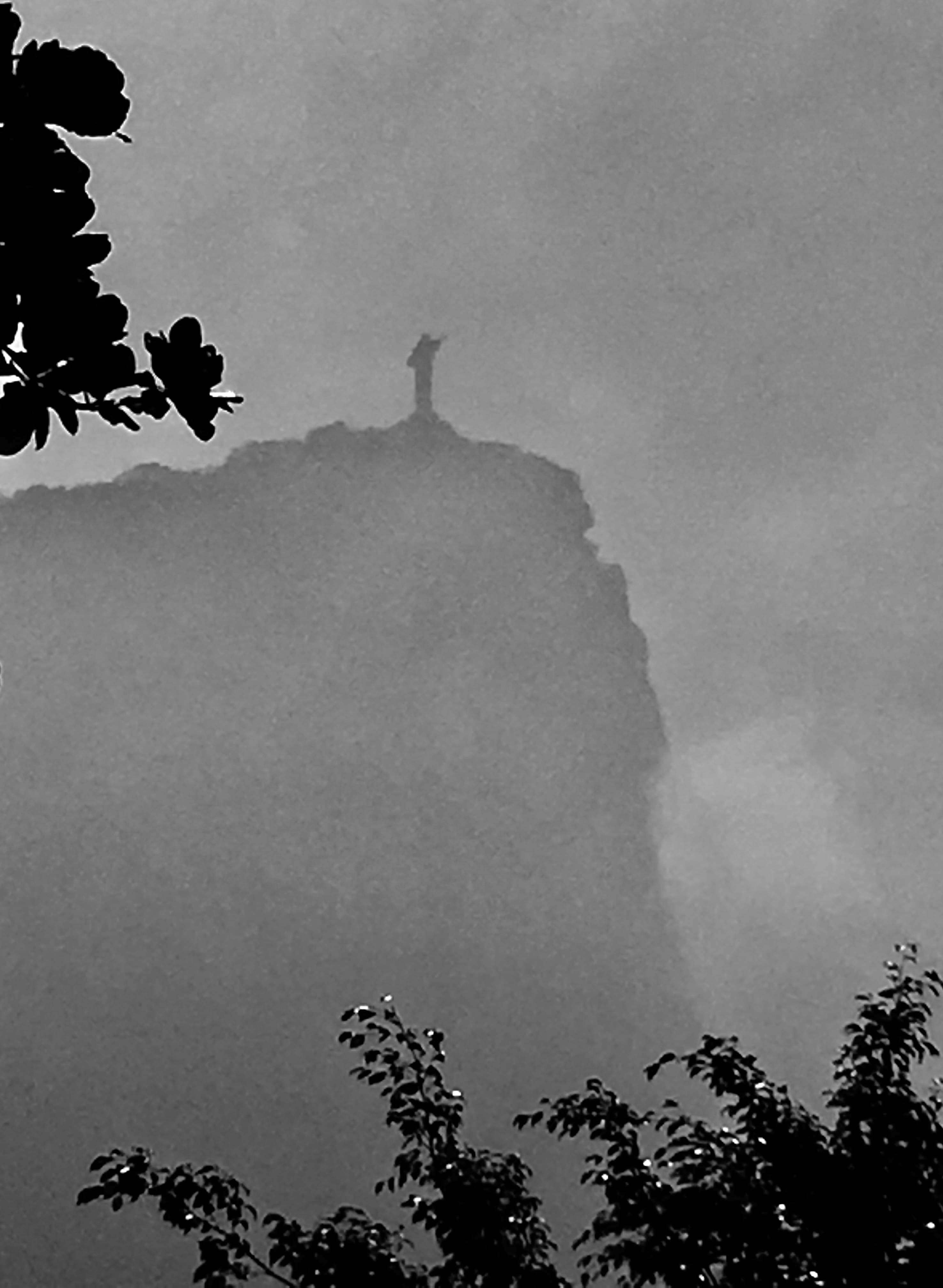 Cristo Redentor rises up through the mist, Rio de Janeiro, Brazil